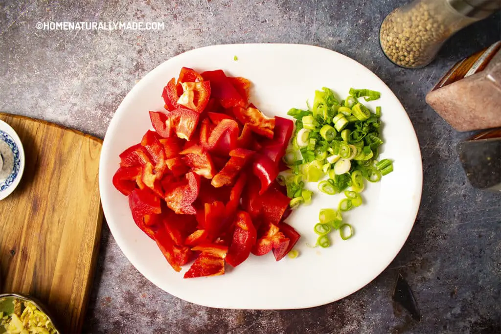 Red Bell Pepper Slices and Chopped Green Onions