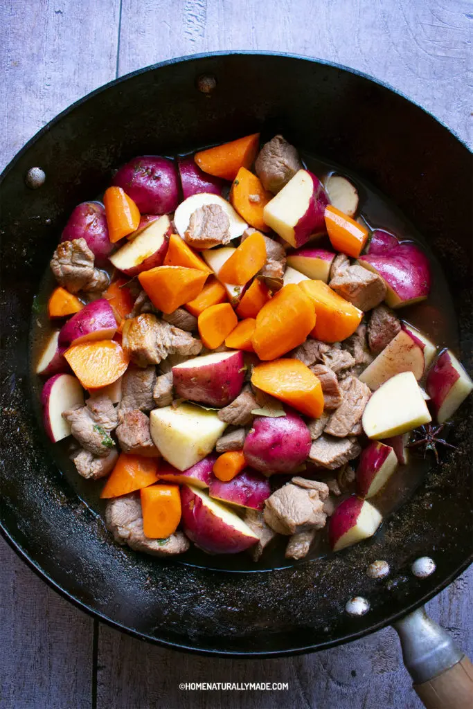 pork with potato and carrots mixed with seasonings