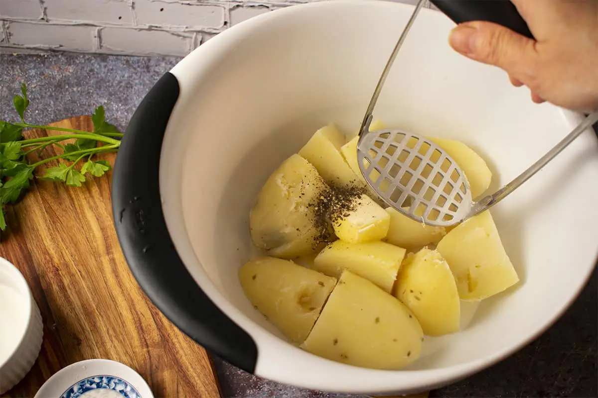 mash boiled potatoes