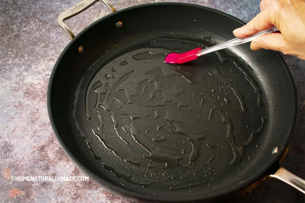 Disperse Avocado Oil on a fry pan