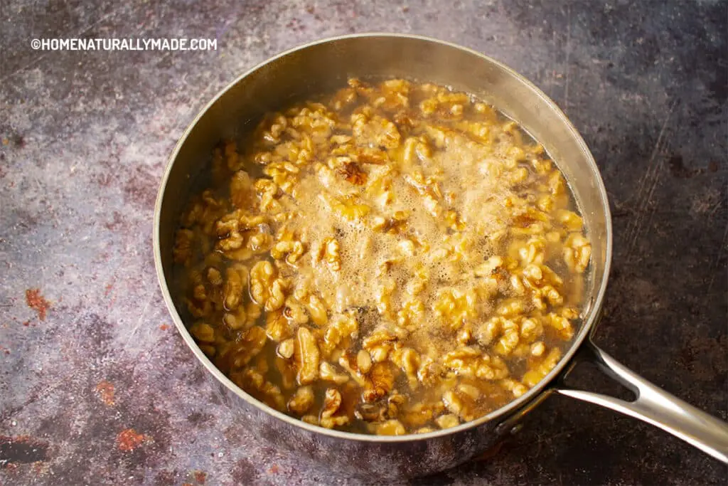 Blanching raw walnuts before roasting