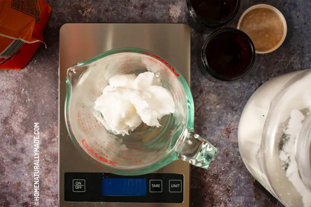 Measuring Out Creamy Coconut Oil for making toothpaste