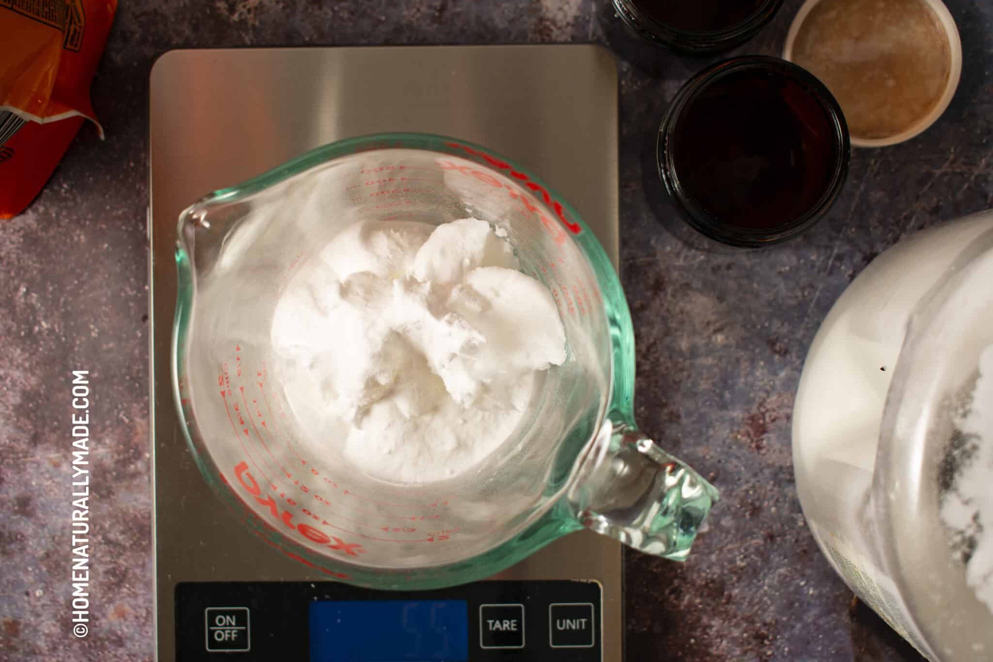 Add baking soda to creamy coconut oil for homemade tooth paste