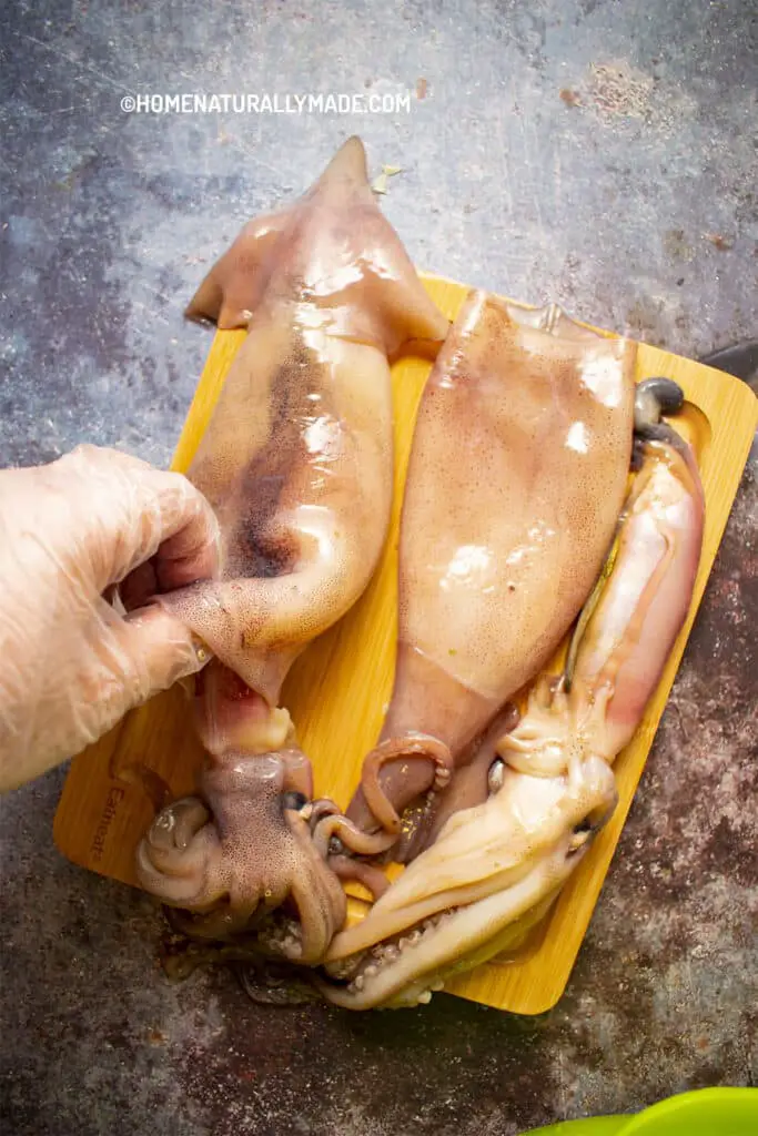 how to clean whole squid, remove head from squid body