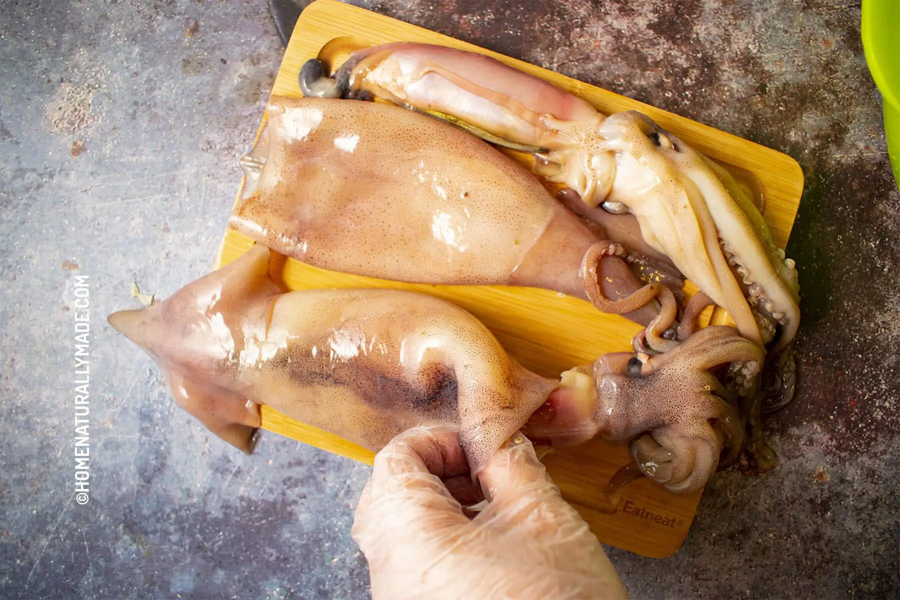 how to clean whole squid, remove head from squid body