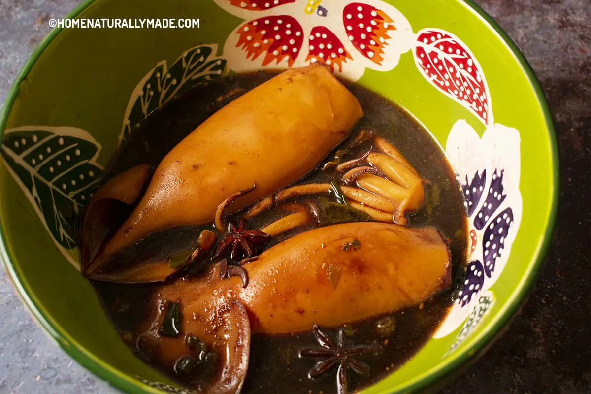 Cool the braised whole squid in the braising juice before serving