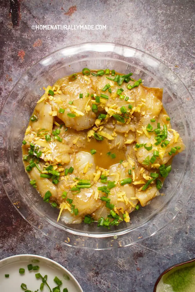 Marinated cod fillet slices in the steaming ware