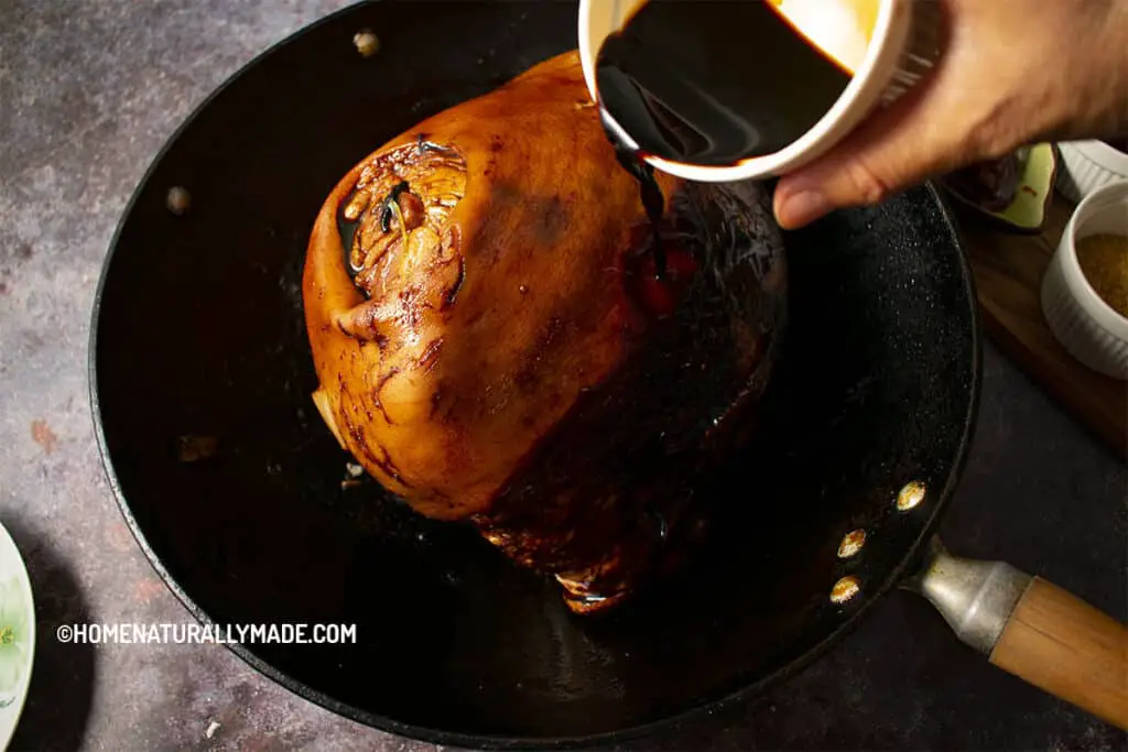 Pour Soy Sauce over Ham Hock for Chinese Braised Ham Hock