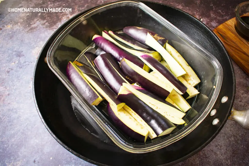 steam eggplant in a 9x13-inch glassware paired with 14-inch wok