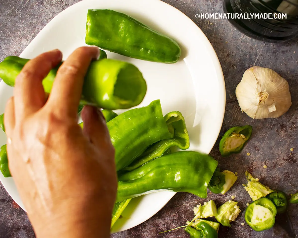 Prepare long green pepper for Hu Pi Qing Jiao {Pan Fried Green Peppers}