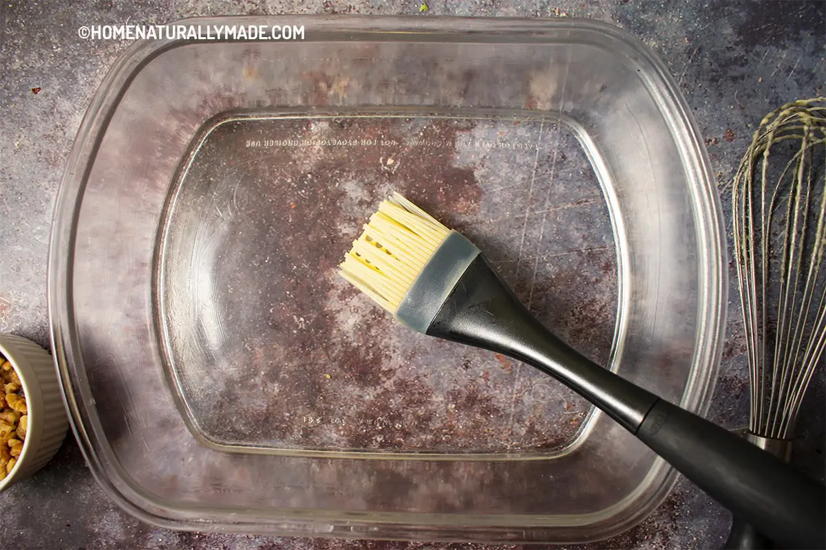 Grease the rectagular glass baking dish with coconut oil using a soft kitchen brush