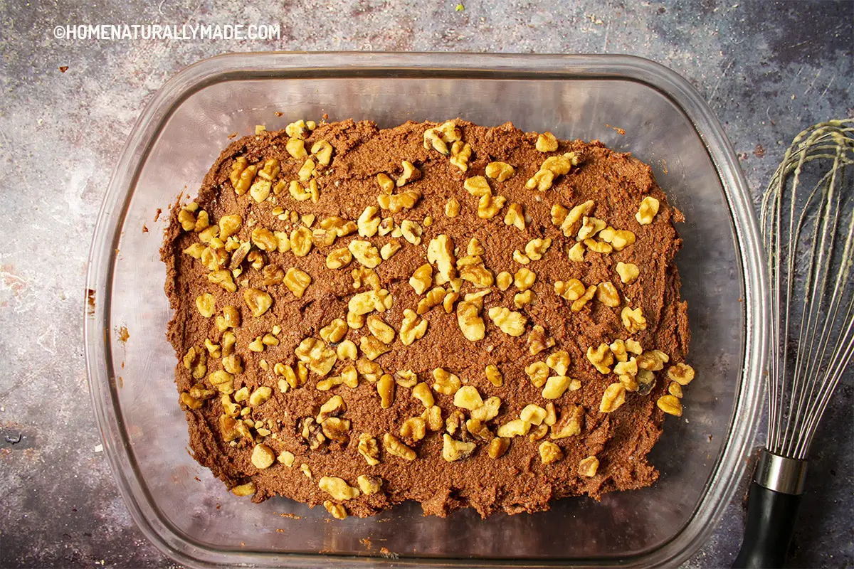 Add toppings to the batter for coconut flour brownies
