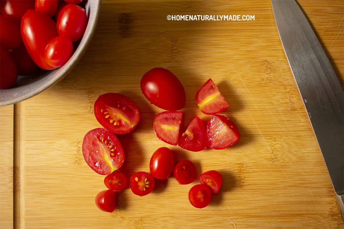 Cut tomato into bite-size chunks