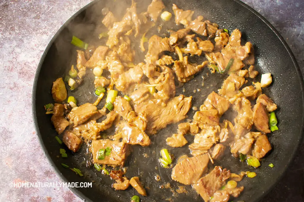 Sear Marinated Beef Slices in a hard anodized fry pan in small batches