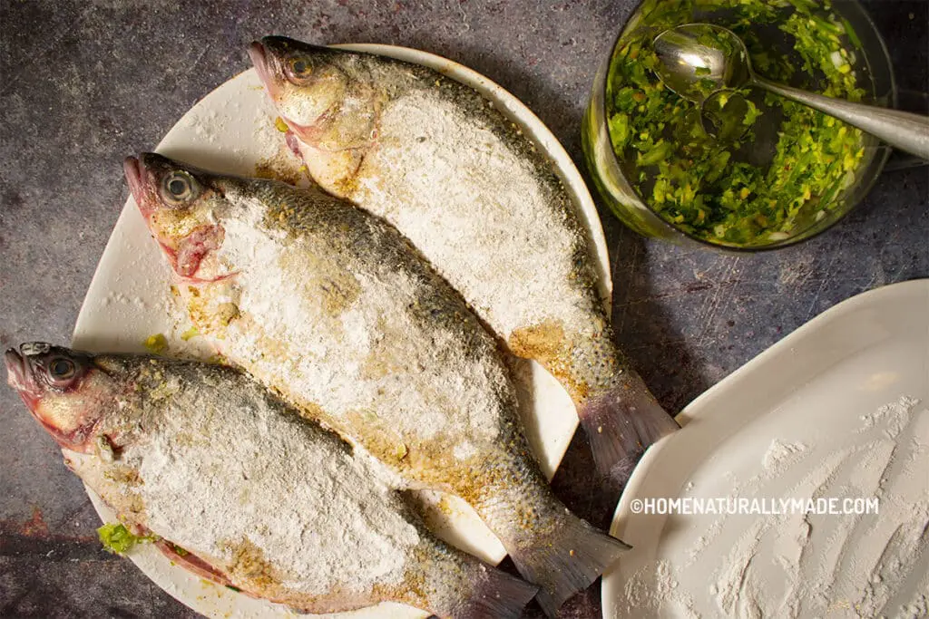 Coat seasoned fish a arrowroot flour for fried bass