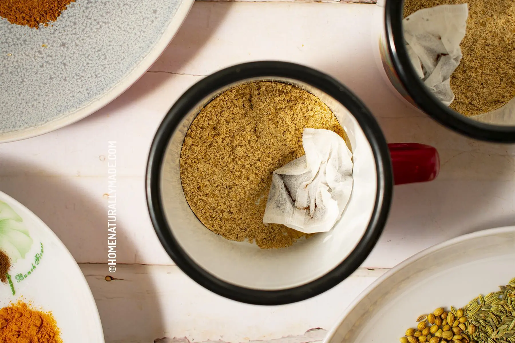 Add homemade Instant Chai Mix and tea bags into a mug
