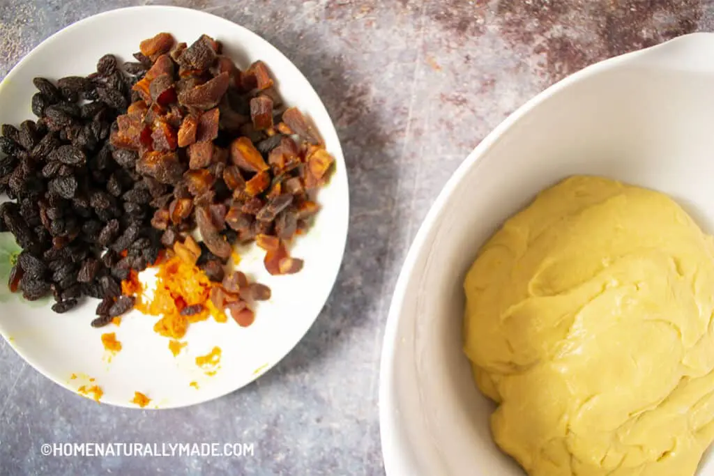 soft stretchy dough and dried fruits for making Italian Panettone