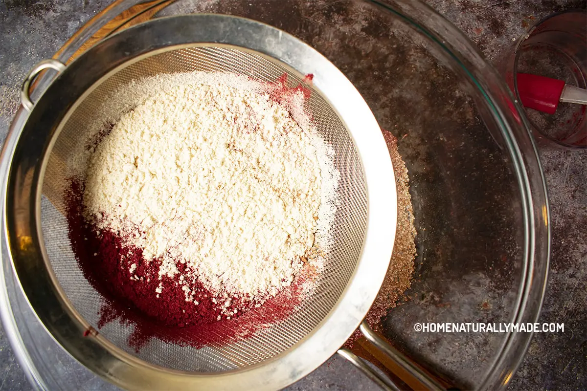Sifting dry ingredients for Red Velvet Cake