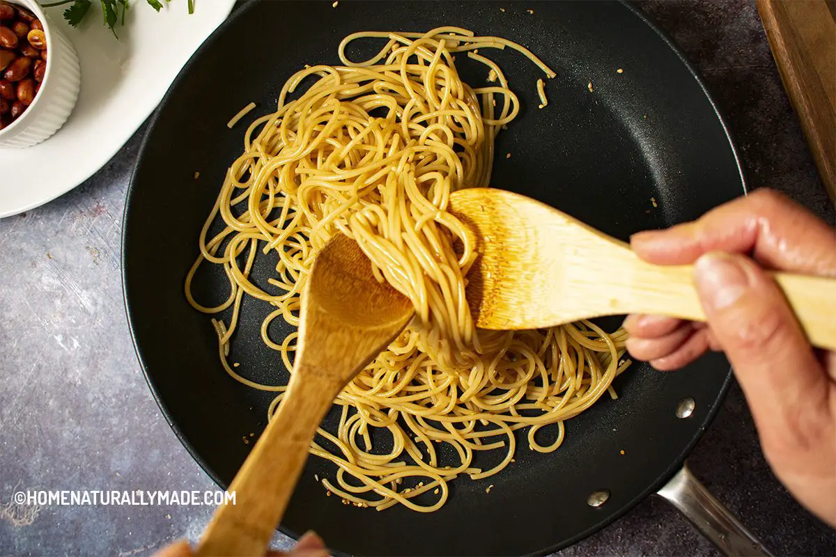 Mixing Garlic Sesame Noodles in the Fry Pan
