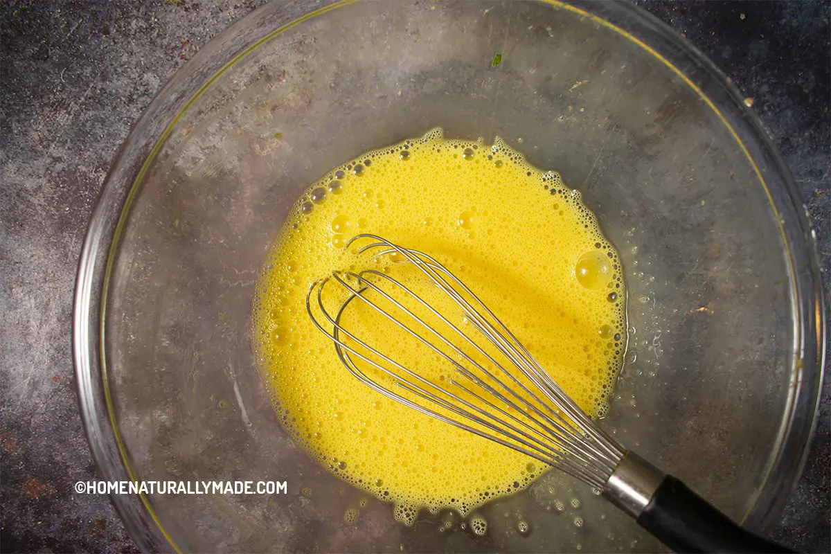 Whisked egg liquid in the mixing bowl