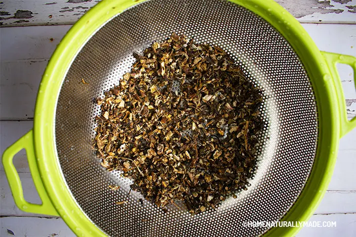 rinse cut & sifted dried dandelion root in the colander