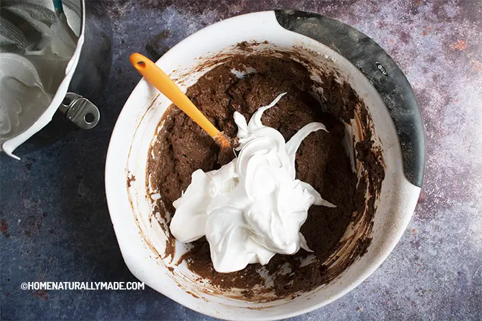 add homemade meringue for making chocolate muffin batter