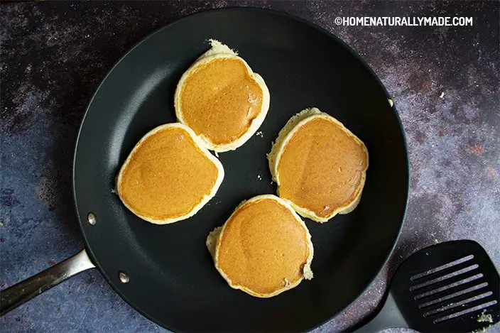 coconut flour pancakes in the frying pan