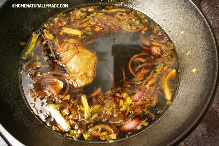 Master Stock Lu Sauce in the cast iron wok