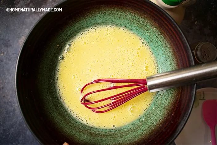 whisk egg and milk to blend in a bowl