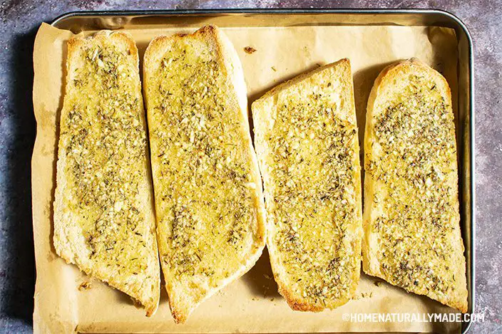 freshly toasted Garlic Bread in the baking pan