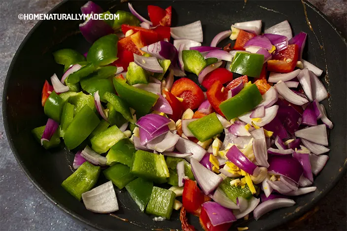 saute red & green bell peppers, red onion, and garlic in the fry pan
