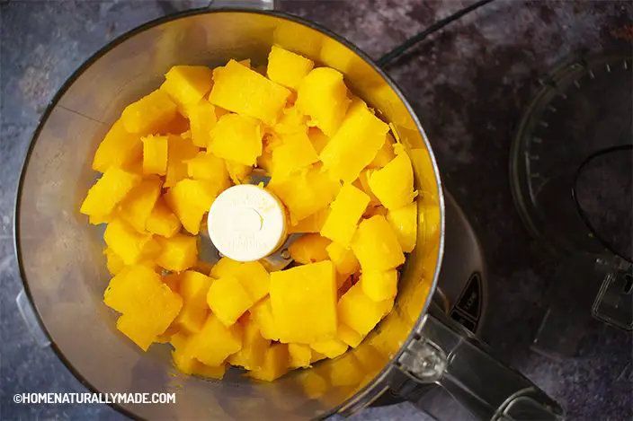cut steamed pumpkin into small pieces and blend into pumpkin puree in a food processor