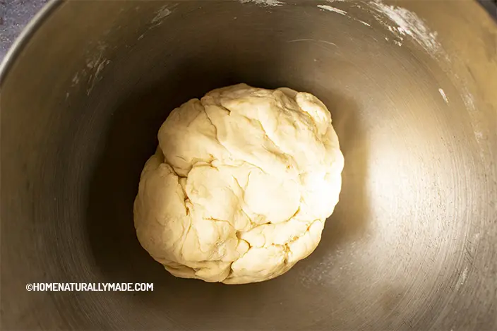 smooth half water half milk yeast dough in the Mixer before proofing