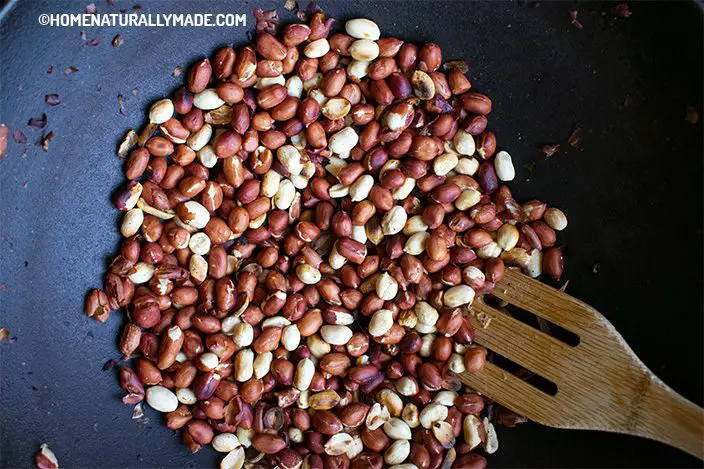 dry roasted peanuts in the cast iron wok