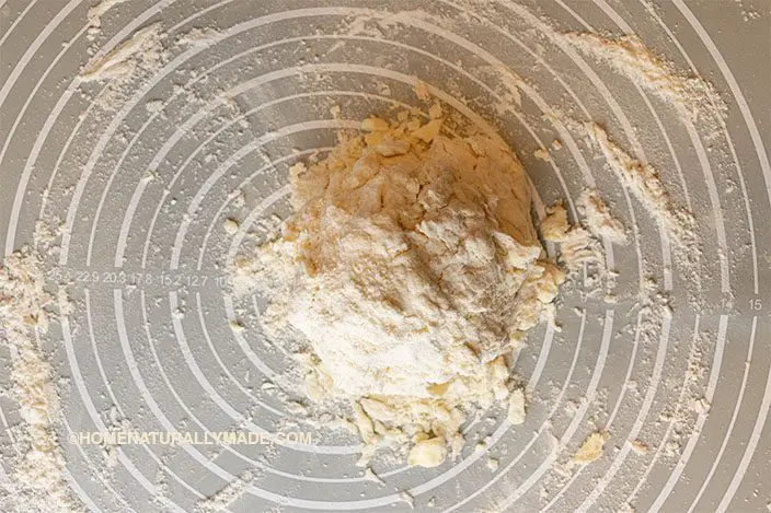 place the rested puff pastry dough on a floured dough Matt