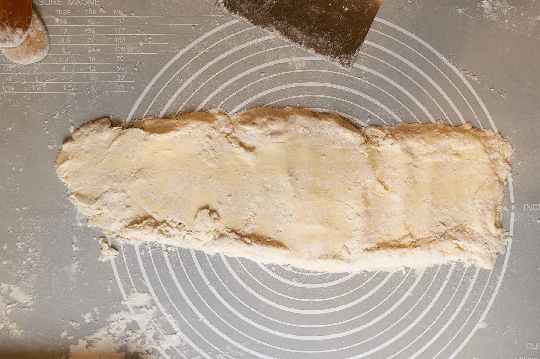 roll out the shortcrust dough into a long rectangle