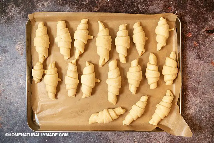 croissants double their sizes in the baking pan