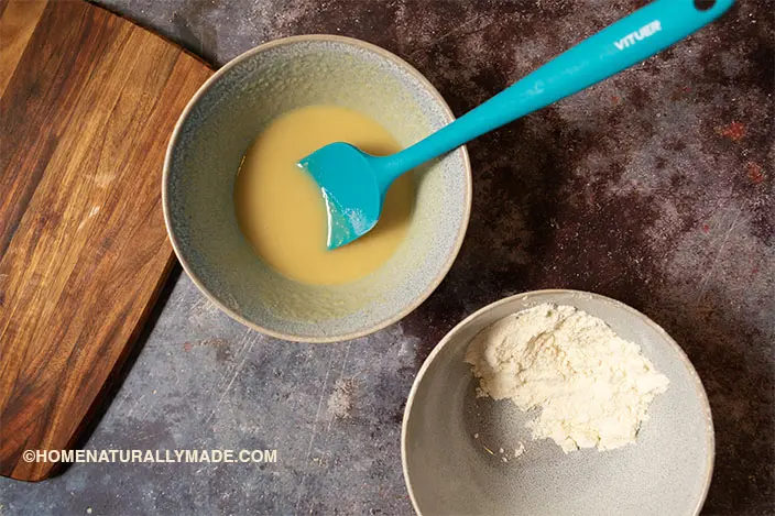 fold the cake flour into the warm oil until fully blended