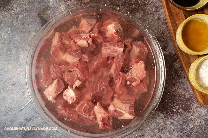 soak beef chunks in cold water 