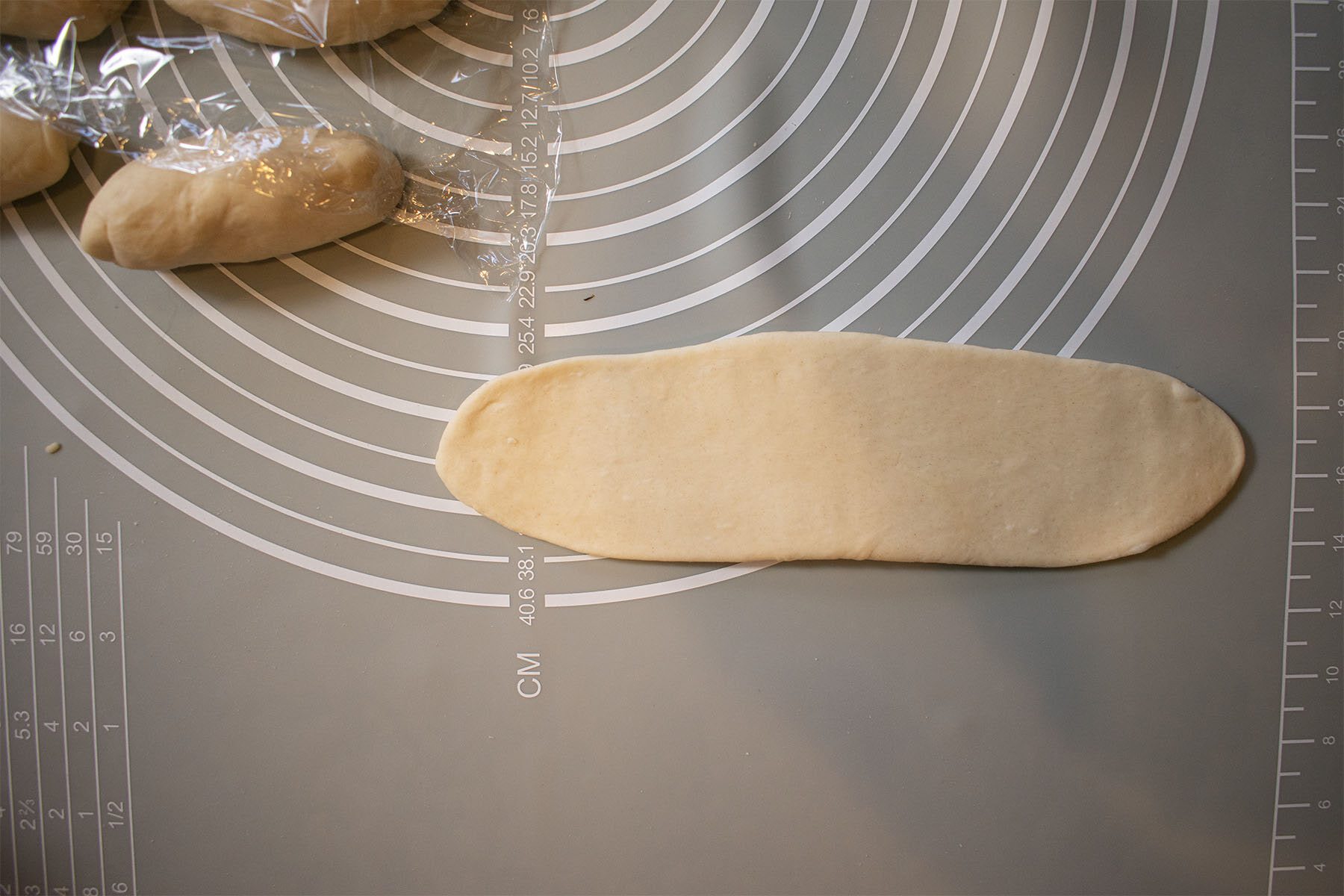 roll out the dough into a long strip
