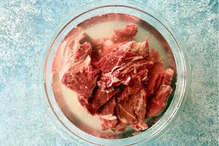 soak steak thin slices in cold water