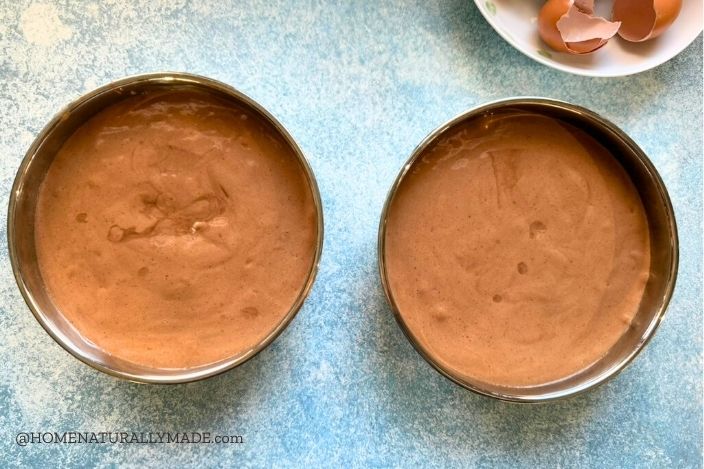 chocolate sponge cake batter in cake pan