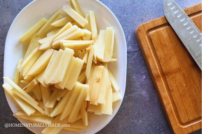 cut potato into french fries form
