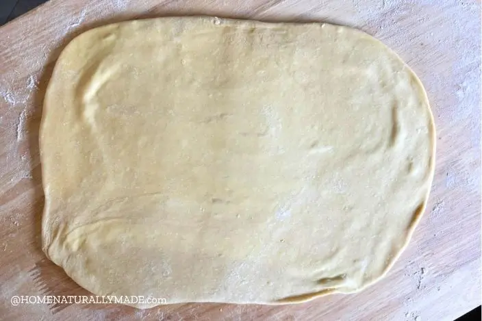 encase the butter and roll out flat